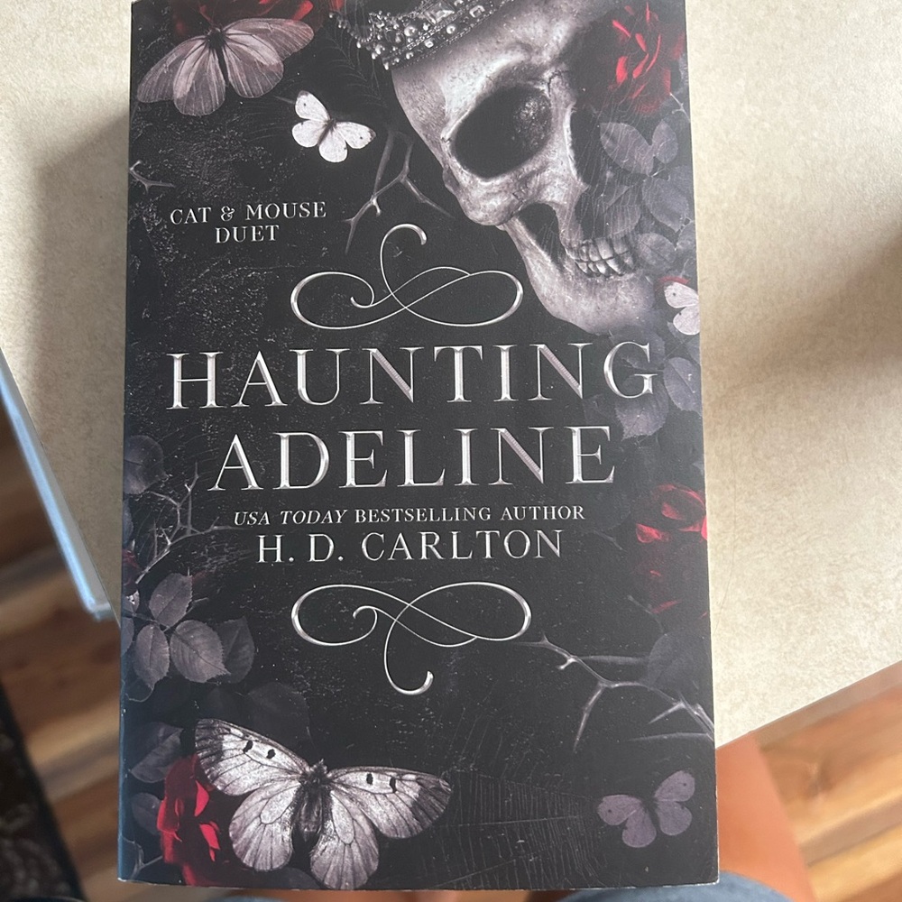 Haunting Adeline Book by H.D. Carlton - Black Cover